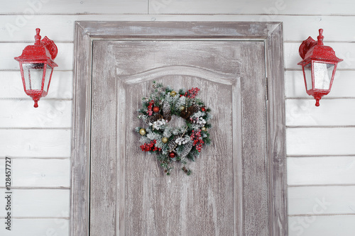 Christmas wreath on door in the interior