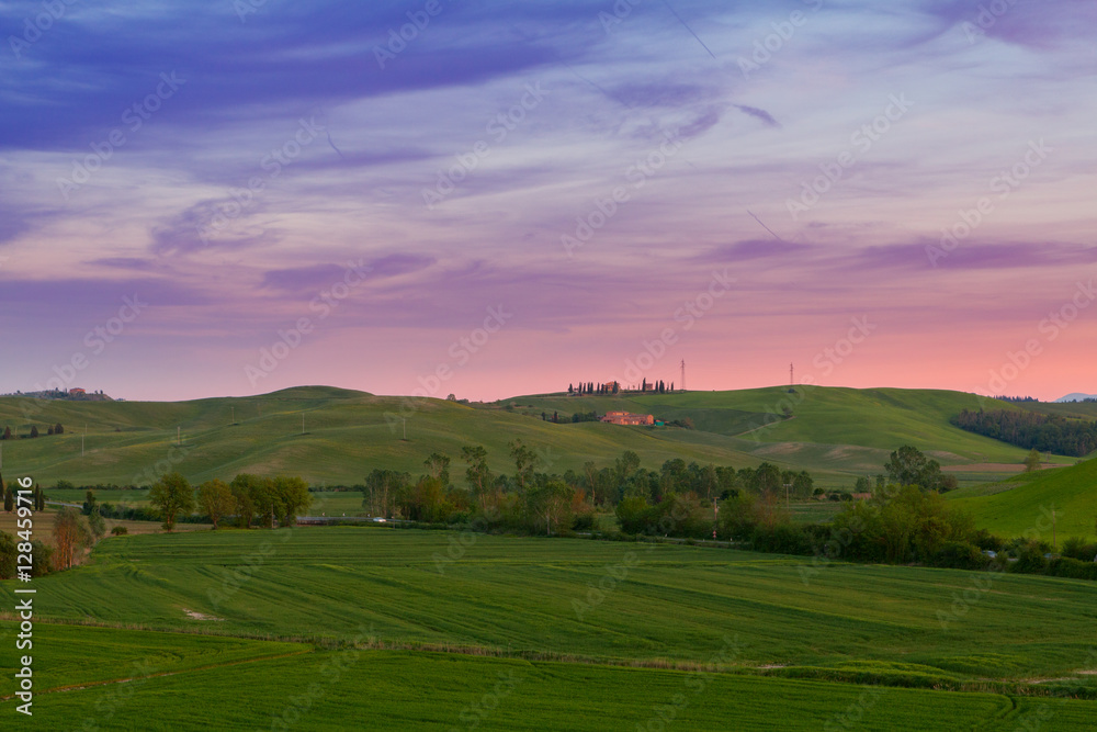 Typical Tuscany landscape springtime at sunset in Italy