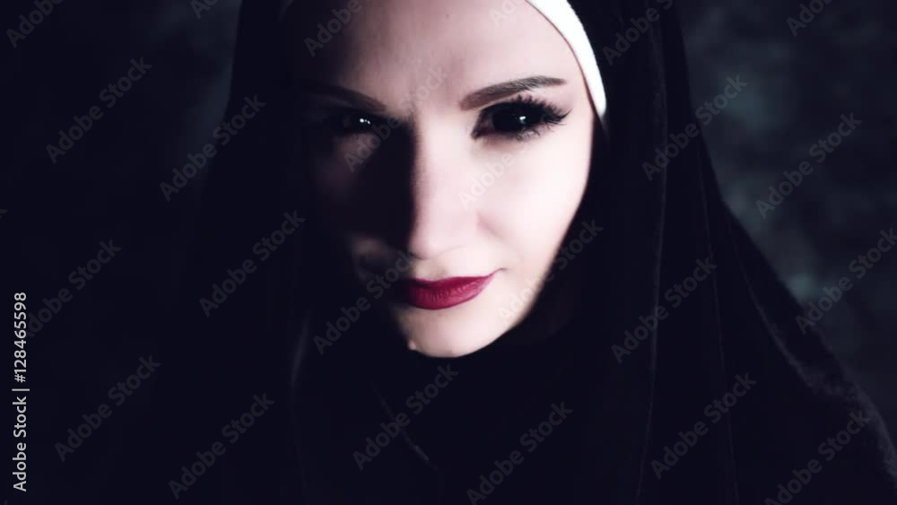 4k Halloween Shot of a Horror Nun Looking at Camera with Blackout Eyes 4k Halloween Shot of a Horror Nun Looking at Camera with Blackout Eyes