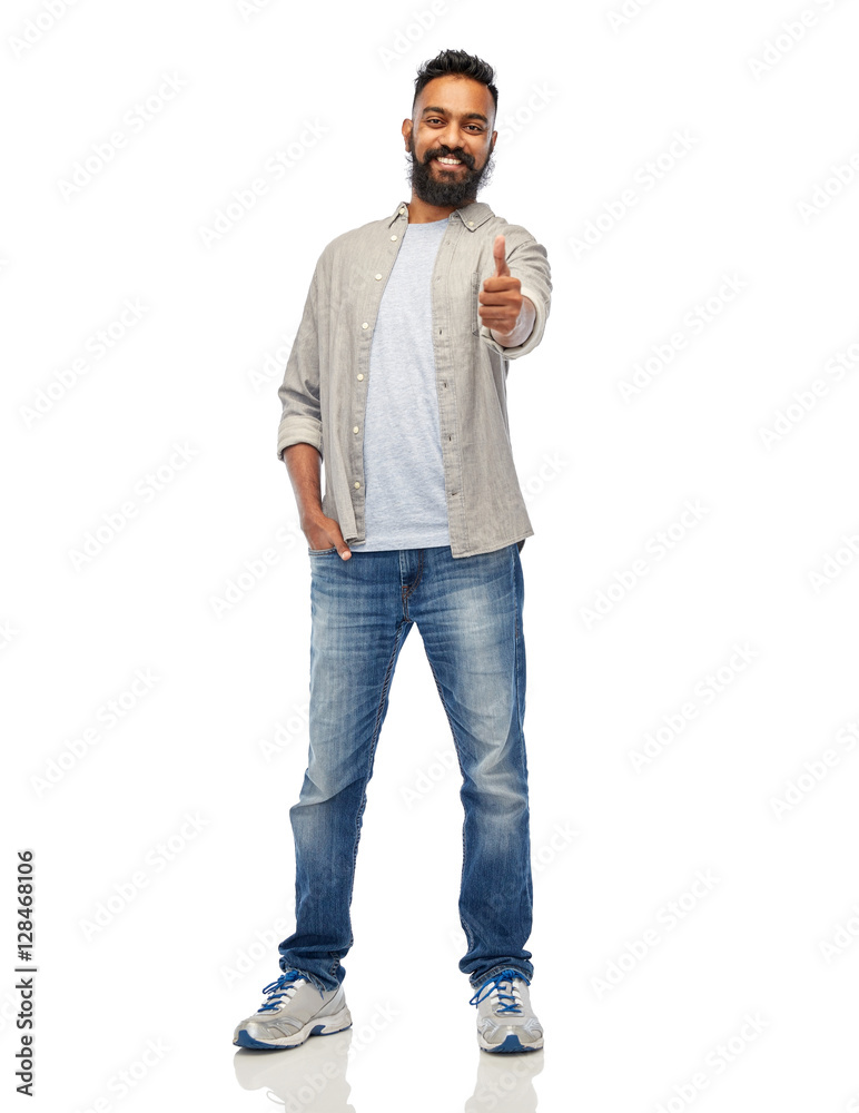 happy indian man showing thumbs up over white happy indian man showing thumbs up over white