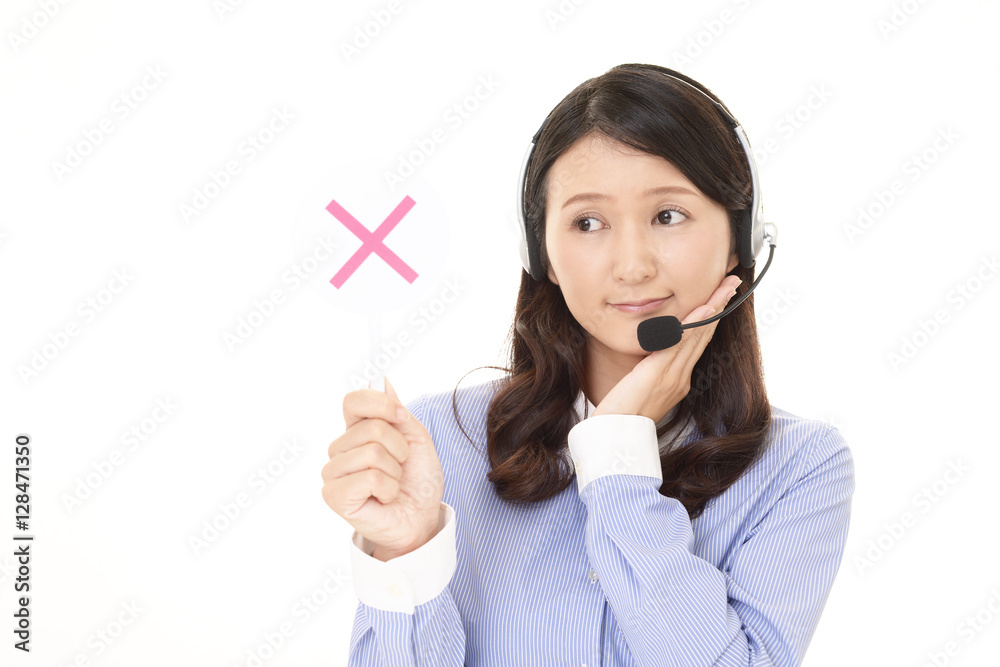 不安そうな表情のオペレーター 不安そうな表情のオペレーター