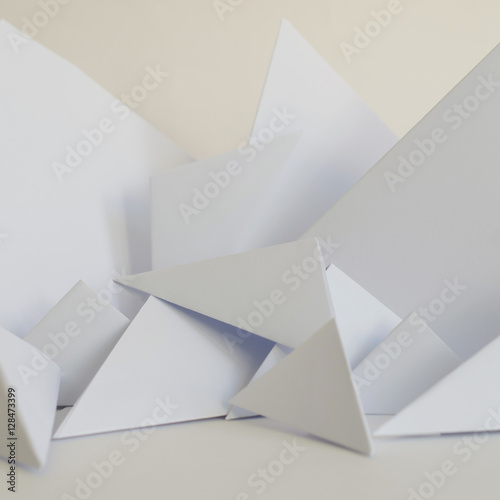 Abstract background of white paper triangles