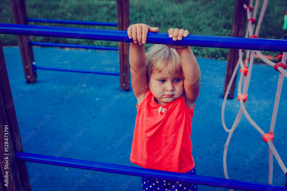 little girl playing on monkey bars, kids sport little girl playing on monkey bars, kids sport
