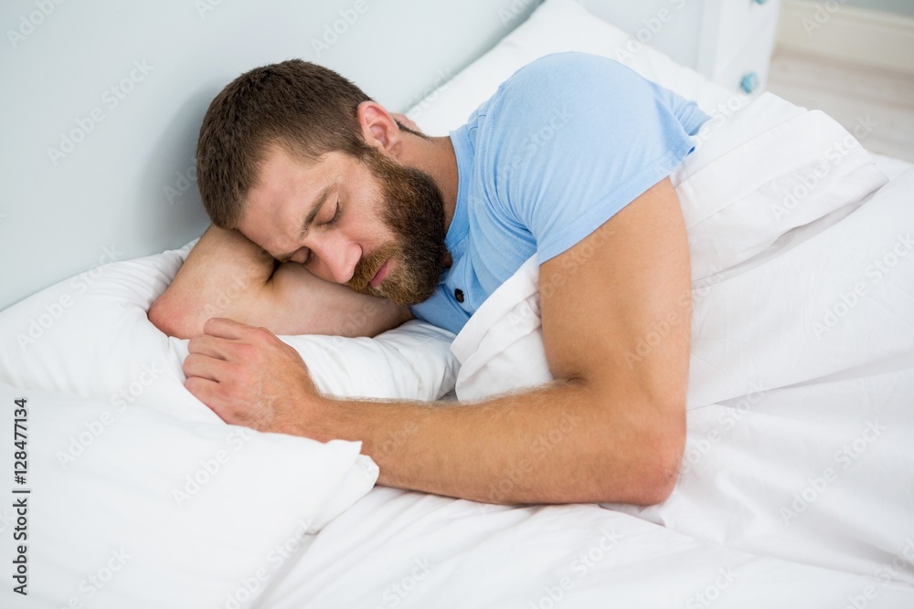Man sleeping on bed Man sleeping on bed