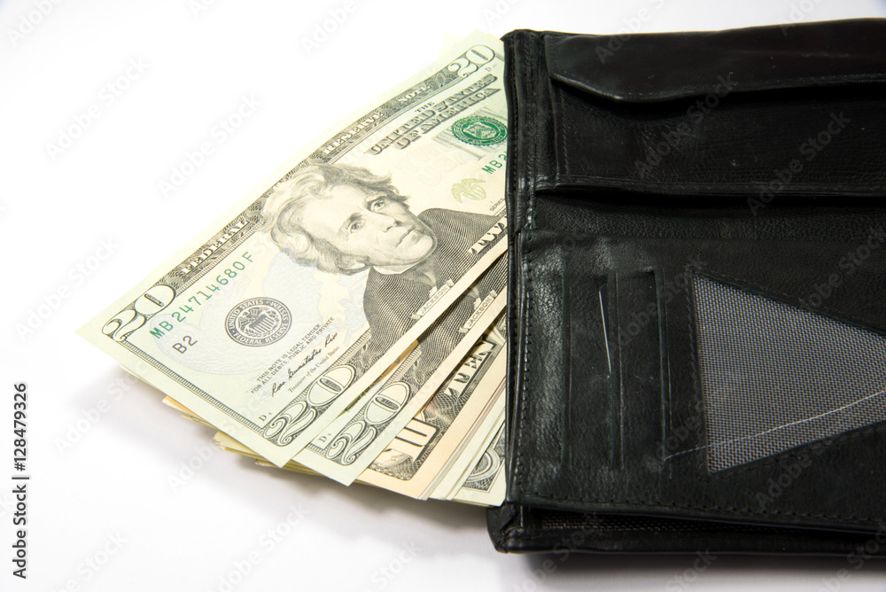 Eine Geldbörse und viele Dollar Scheine Eine Geldbörse und viele Dollar Scheine