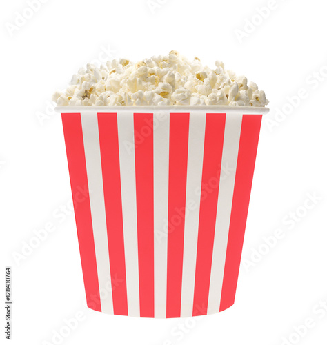 Popcorn in classic striped bucket isolated on white background