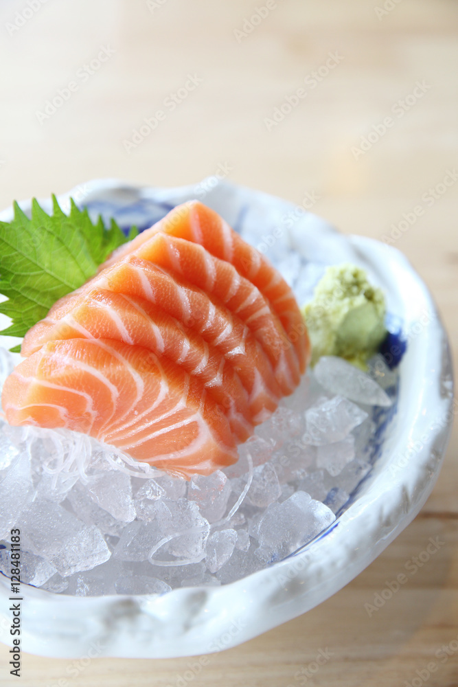 salmon sashimi on wood background , Japanese food