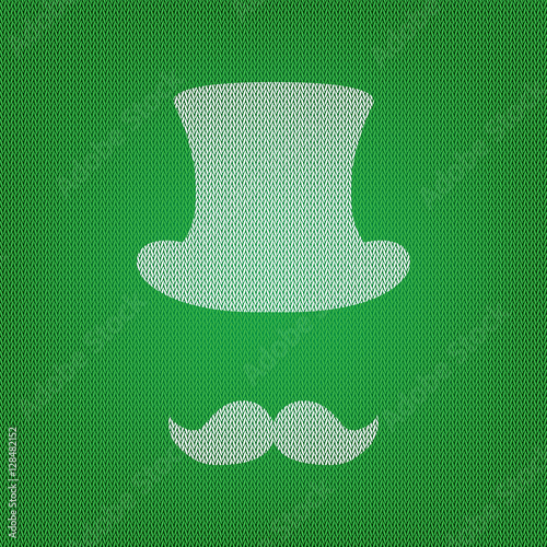 Hipster accessories design. white icon on the green knitwear or