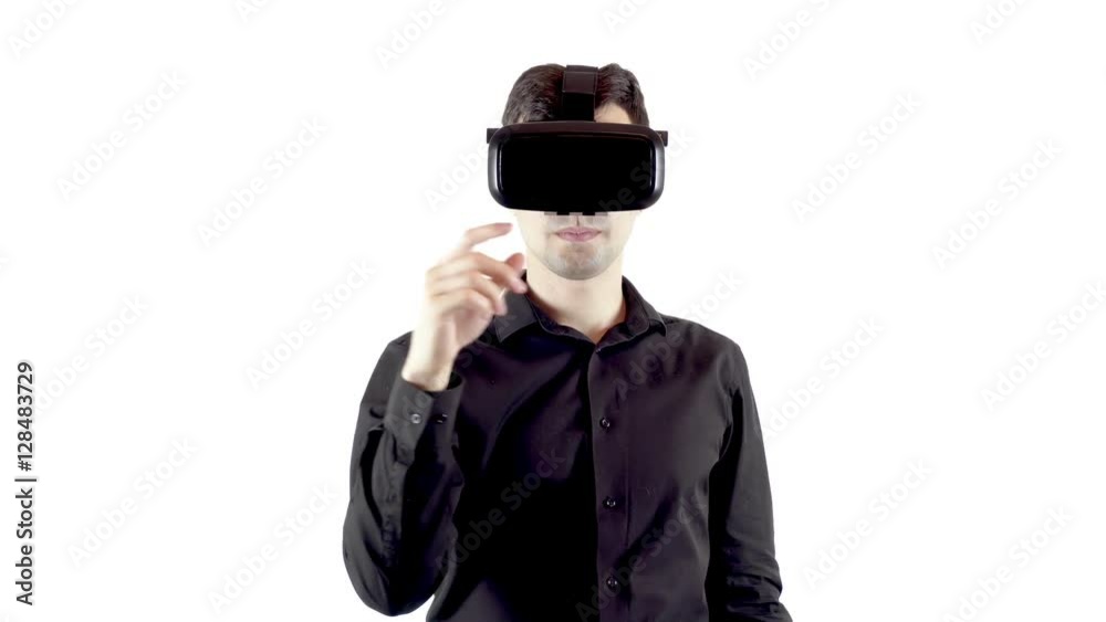 Man wearing virtual reality goggles. Studio video, white background Man wearing virtual reality goggles. Studio video, white background
