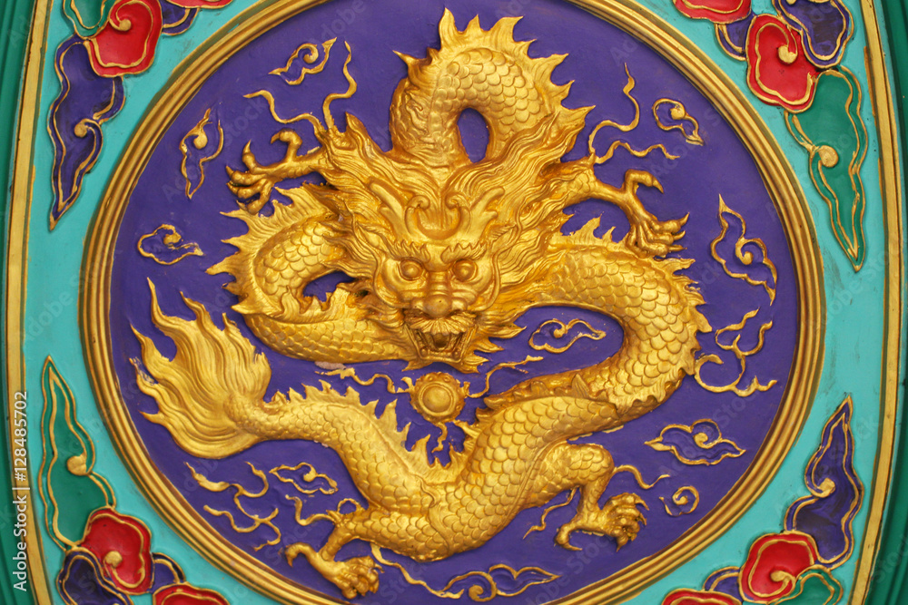 close-up golden dragon marble carving wall, Decorative Chinese art style at Chinese public temple close-up golden dragon marble carving wall, Decorative Chinese art style at Chinese public temple