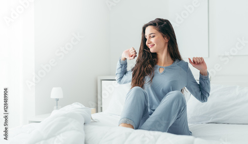 Girl waking up and stretching