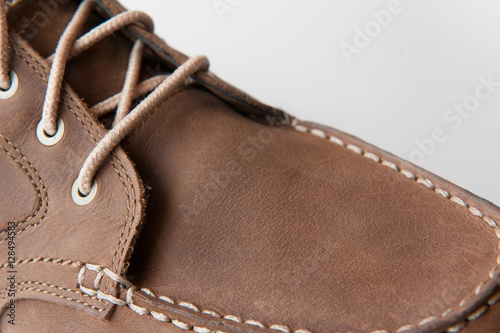 Male shoes over white