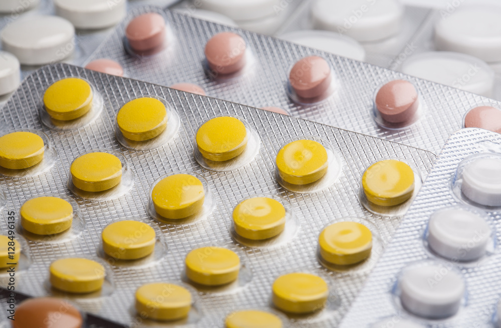 tablets are a lot of yellow white and brown tablets are a lot of yellow white and brown