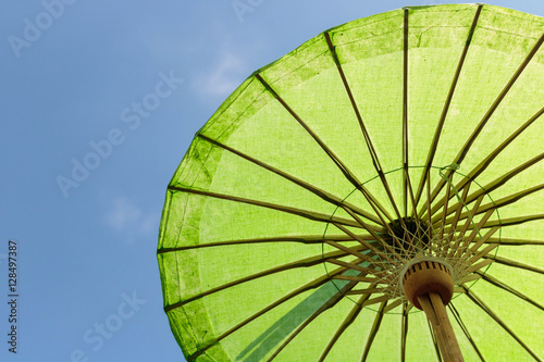 Handmade umbrella on blue sky
