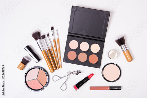 Professional makeup tools, flatlay on white background