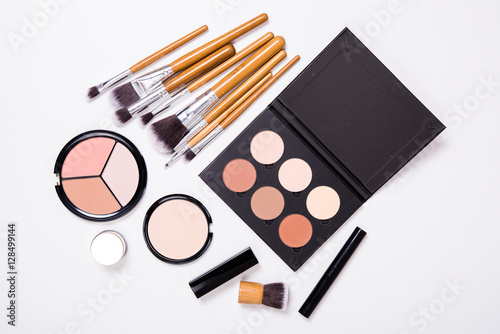 Professional makeup tools, flatlay on white background