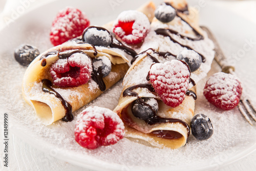 Pancakes with berries and m...