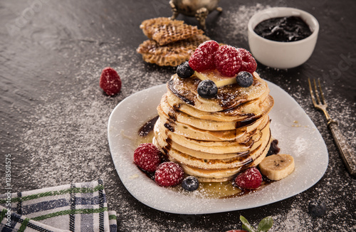 Pancakes with berries and m...