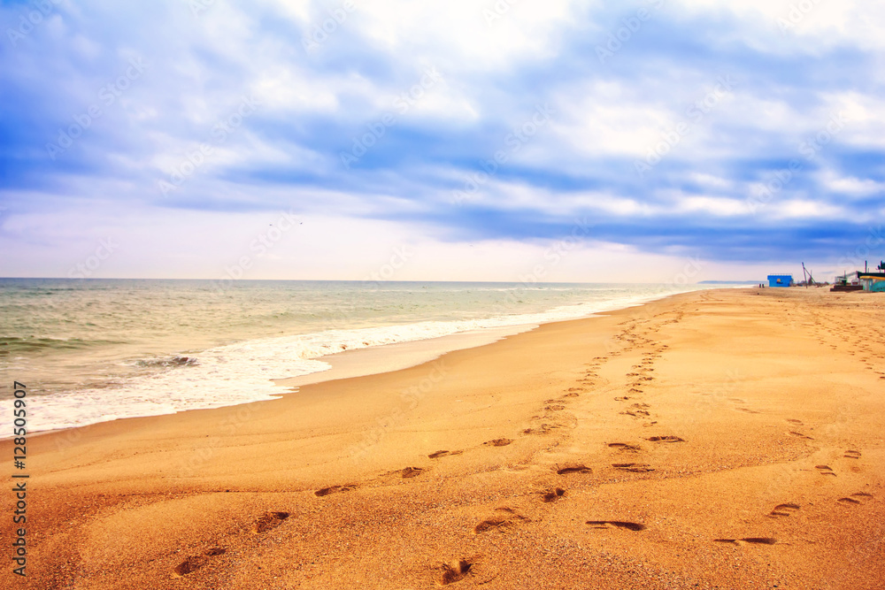 beach footprints in the sand