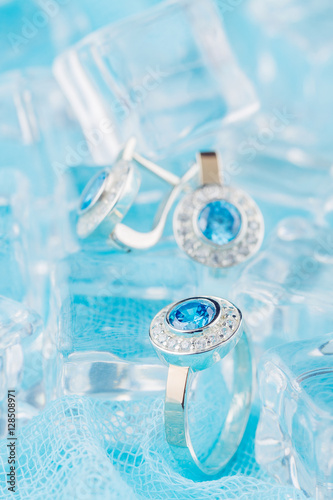 Silver ring with zircon and blue gemstone © torriphoto