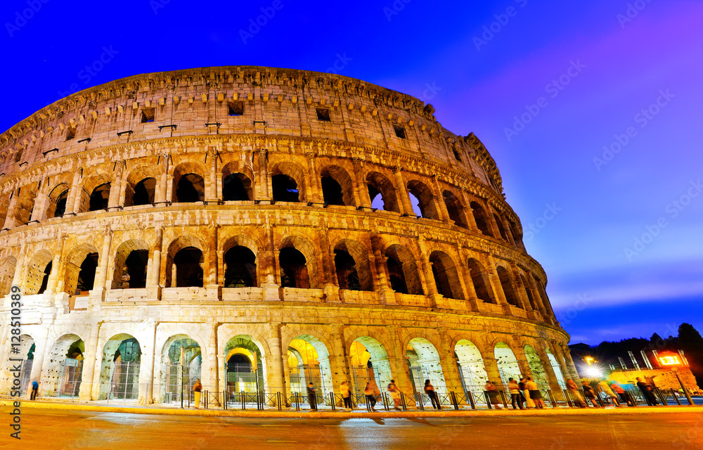 View of Colosseum at night in Rome, Italy