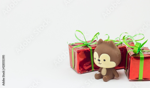 Christmas gift boxes and teddy bear isolated on white background