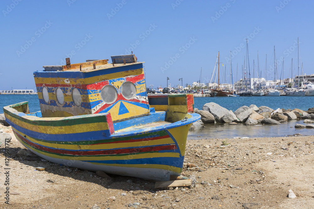 Old abandoned boat in the port of Naxos, Greece