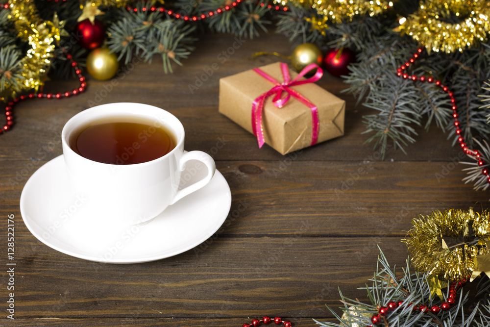 white cup of tea, Christmas toys and gifts