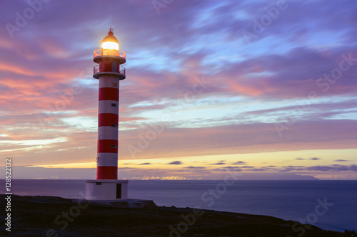 Sunset view of the lighthouse of Sardina on the island of Gran C