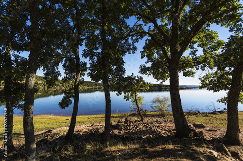 Beautiful backlight in the lake. Embalse Cuerda del Pozo, Soria, Spain, Europe.