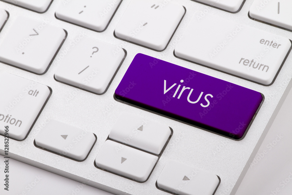 Virus word written on computer keyboard. Virus word written on computer keyboard.