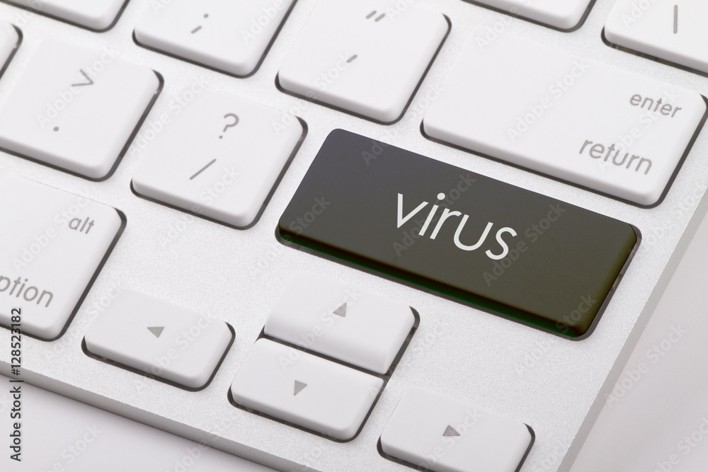 Virus word written on computer keyboard. Virus word written on computer keyboard.