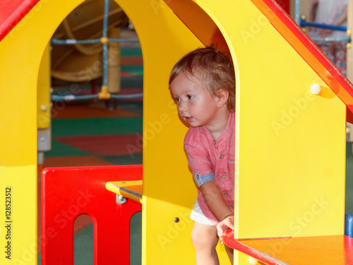 Little children activities, story of family games. Child playing outside © bravissimos