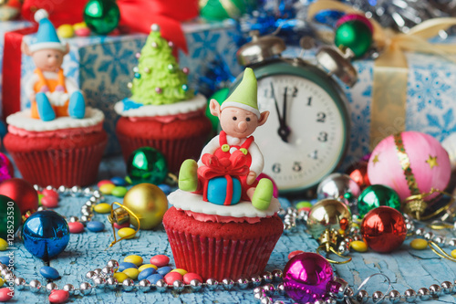 Christmas cupcakes with colored decorations © lisssbetha