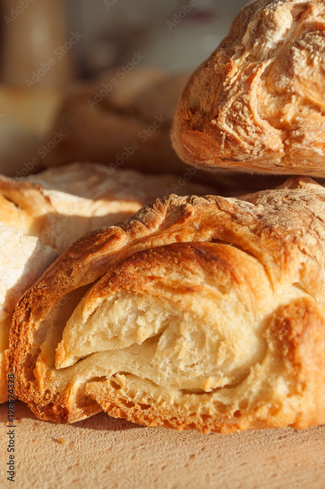 Homemade french baguette on a wooden surface