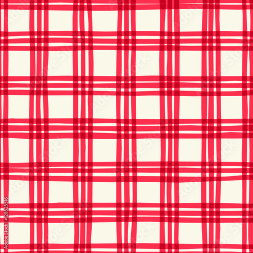 Plaid seamless pattern in red on cream background.