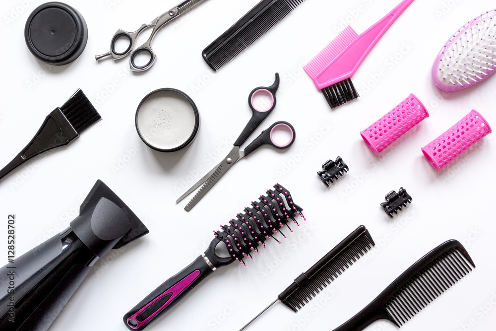 combs and hairdresser tools on white background top view combs and hairdresser tools on white background top view