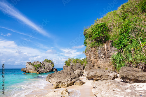 Tropical beach, rocks and ocean