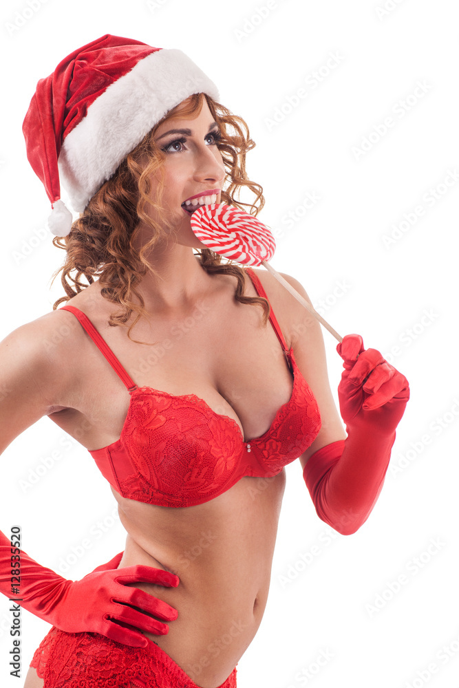 sexy santa girl with candy cane isolated foto de Stock | Adobe Stock