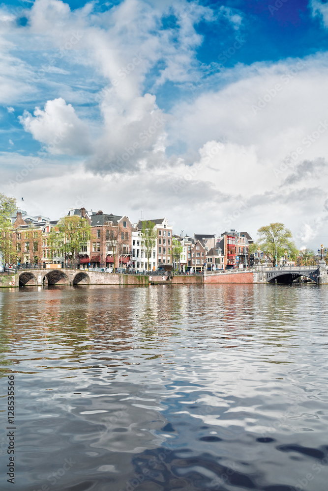 embankment of Amstel canal in Amsterdam, Holland
