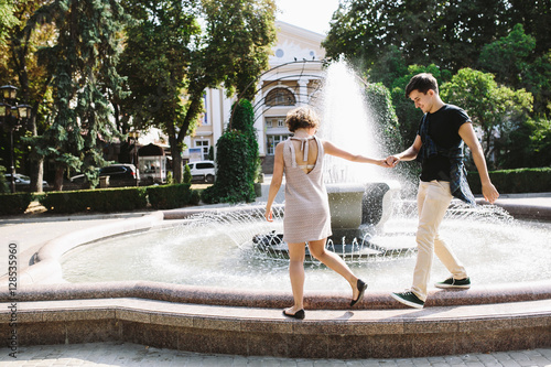 beautiful young couple at the fountain