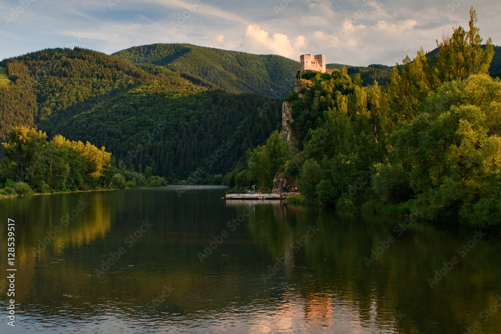 Medieval castle Strecno on Vah river with raft near of town Zilina, central Europe, Slovakia