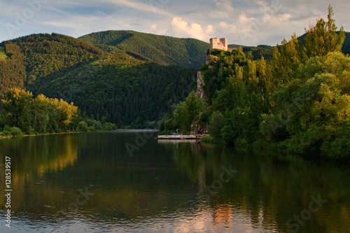 Medieval castle Strecno on Vah river with raft near of town Zilina, central Europe, Slovakia photo