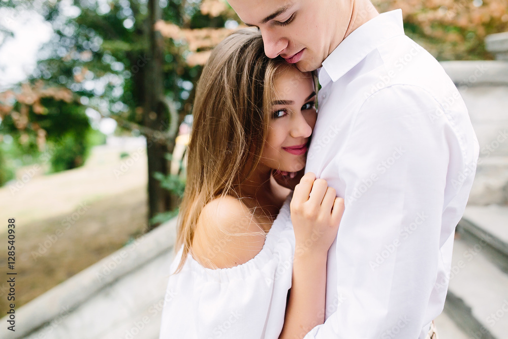 couple posing in the park