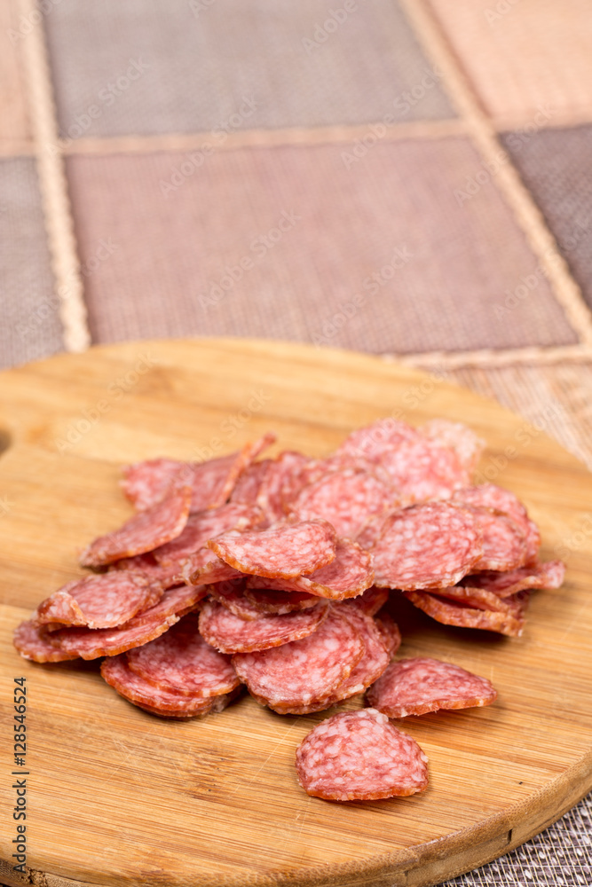 Delicious homemade domestic sausage on the wooden board Delicious homemade domestic sausage on the wooden board