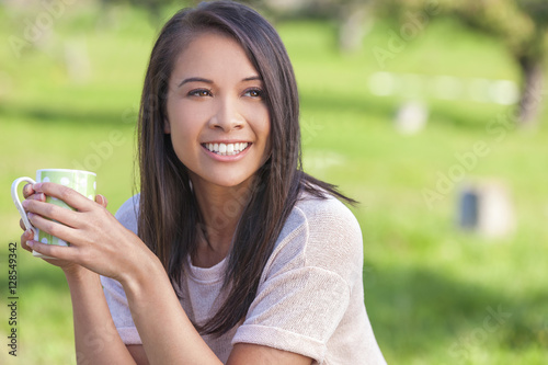 Asian Eurasian Girl Woman Drinking Coffee or Tea