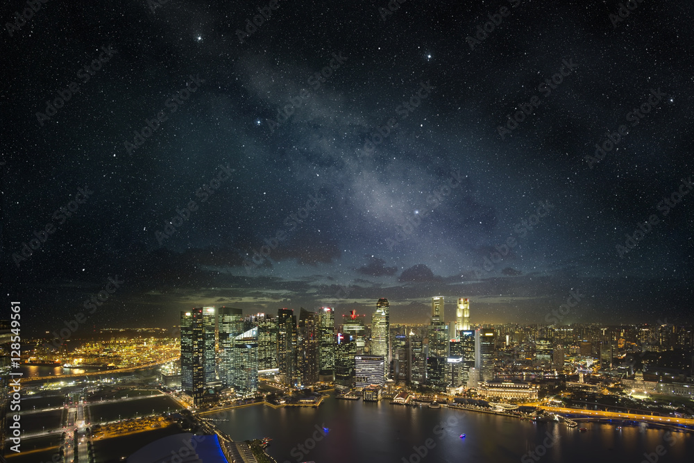 Naklejka premium singapore skyline under a starry night sky