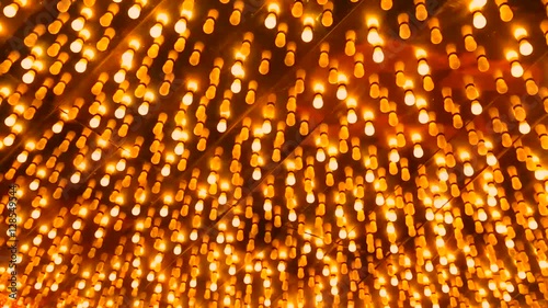 background of yellow flashing light bulbs at casino entrance