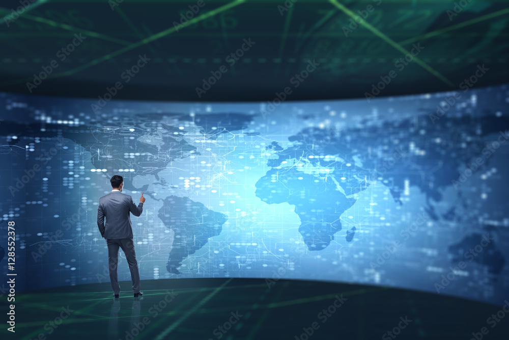 BUsinessman in futuristic computing concept BUsinessman in futuristic computing concept