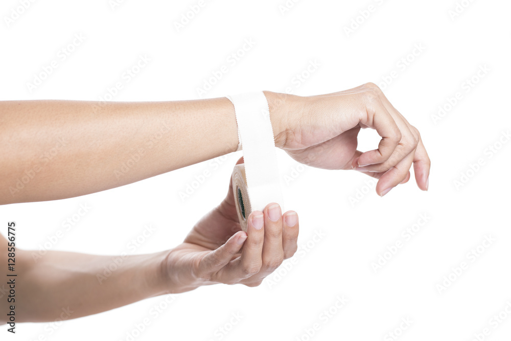 Woman wearing sport tape, wrist injured Woman wearing sport tape, wrist injured